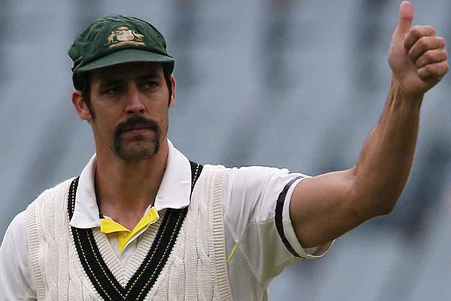 Australia's Mitchell Johnson gives a thumbs up to supporters after winning the second Ashes cricket test against England at the Adelaide Oval December 9, 2013. Australia captured England's four remaining wickets before lunch to close out an emphatic 218-run victory in the second Ashes test on Monday. REUTERS/David Gray (AUSTRALIA - Tags: SPORT CRICKET) - RTX16AFF
