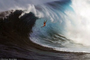 A helpless surfer wipes out