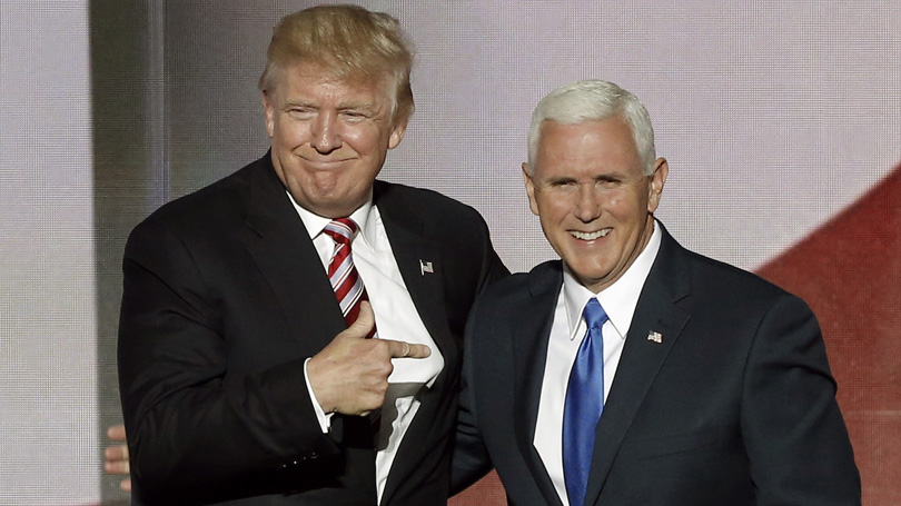 Republican U.S. presidential nominee Donald Trump (L) greets vice presidential nominee Mike Pence after Pence spoke at the Republican National Convention in Cleveland, Ohio, U.S. July 20, 2016. REUTERS/Mike Segar - RTSIYI7