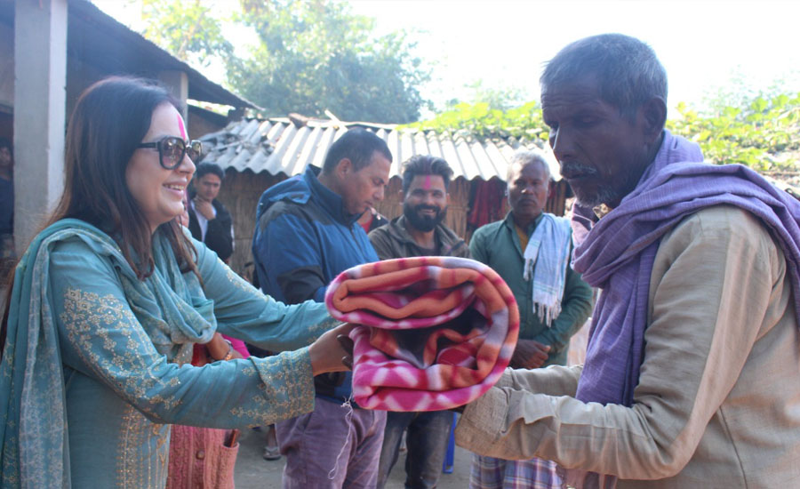 Vinod Chaudhary distributed heat garments to 500 poor households