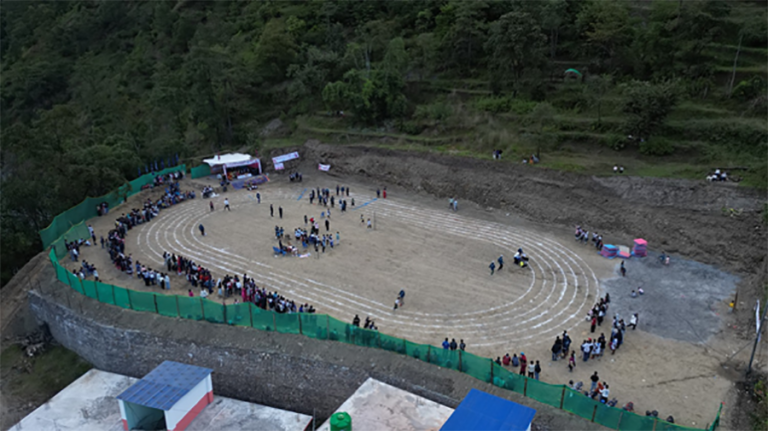 म्याग्दीको लाम्पाटामा पाखो सम्याएर खेलमैदान निर्माण